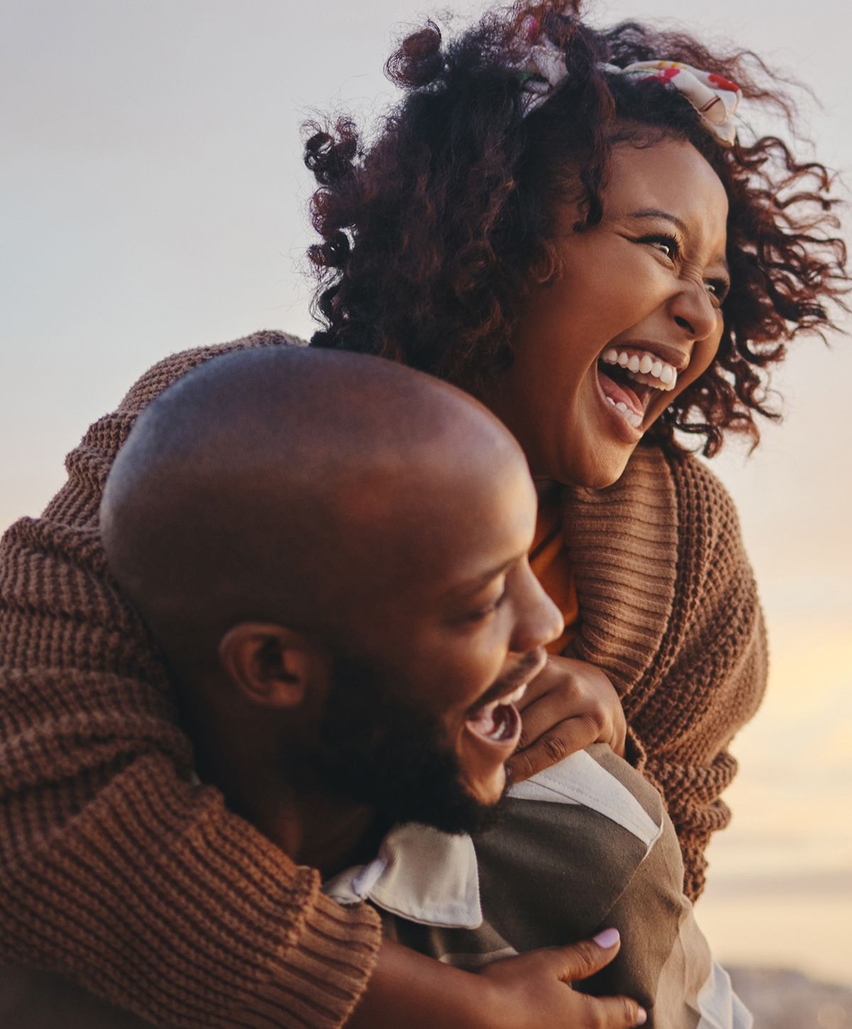 Happy sexual health clinic patient model couple enjoying a joyous moment together.